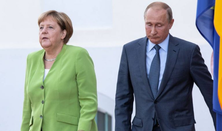 Putin y Merkel